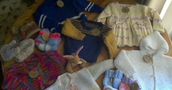 Selection Of Brand New Hand Knitted Baby Clothes
