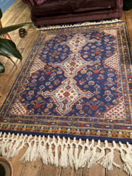 Beautiful blue 5 x 7 Handtufted Wool Rug Excellent condition