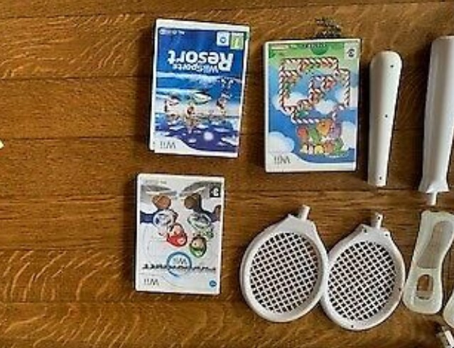 Nintendo Wii Console Pus 3 Games and Accessories  1
