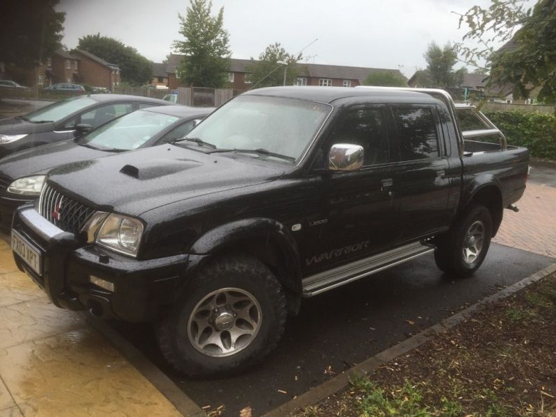  2003 Mitsubishi warrior crew cab runs great now not used  0