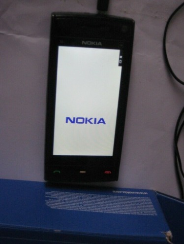 Locked Nokia X6-00 16GB Mobile Phone with Accessories  1