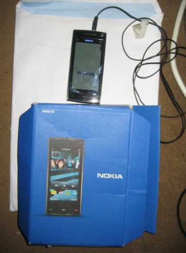 Locked Nokia X6-00 16GB Mobile Phone with Accessories  3
