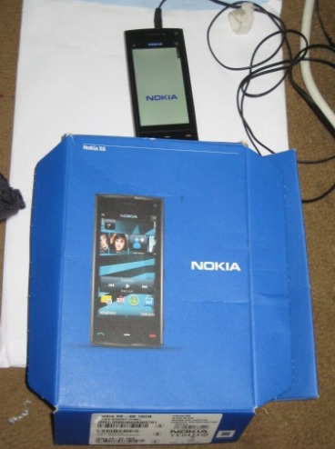 Locked Nokia X6-00 16GB Mobile Phone with Accessories  2