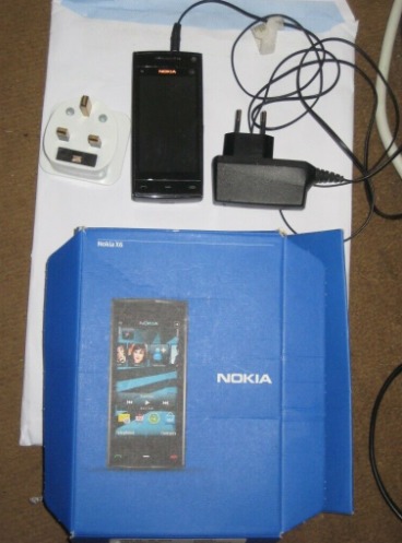 Locked Nokia X6-00 16GB Mobile Phone with Accessories  0